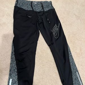 Nike - Dri- Fit black, blue cheetah print RUN capri pants
